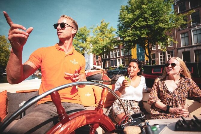 Amsterdam Private Boat Tour with Unlimited Drinks - Skippers who set the tone: friendly service goes a long way