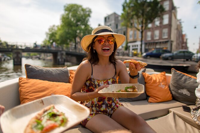 Amsterdam Private Boat Trip with Pizza and Unlimited Drinks - Boat comfort and the food-and-drink rhythm