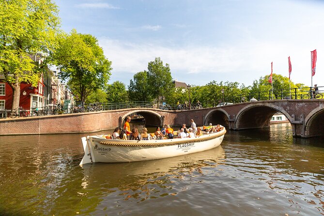 Amsterdam Private Boat Trip with Pizza and Unlimited Drinks - Major church and bell tower viewpoints