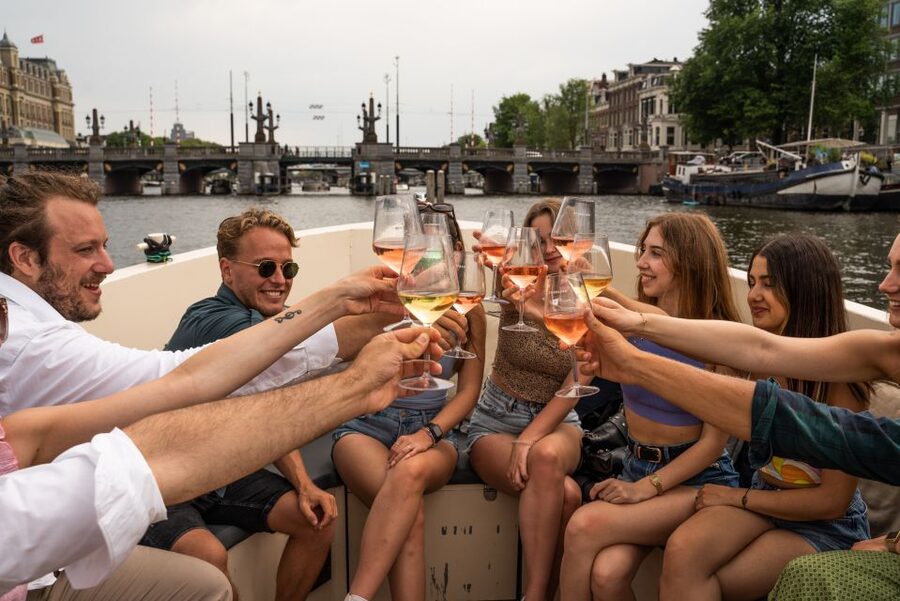 Amsterdam: Private Canal Booze Cruise with Unlimited Drinks - Guides, hosts, and a group that feels cared for