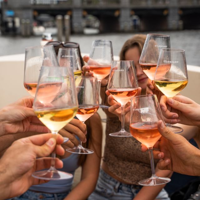 Amsterdam: Private Canal Booze Cruise with Unlimited Drinks - Red Light District pass, quick and close, no walking