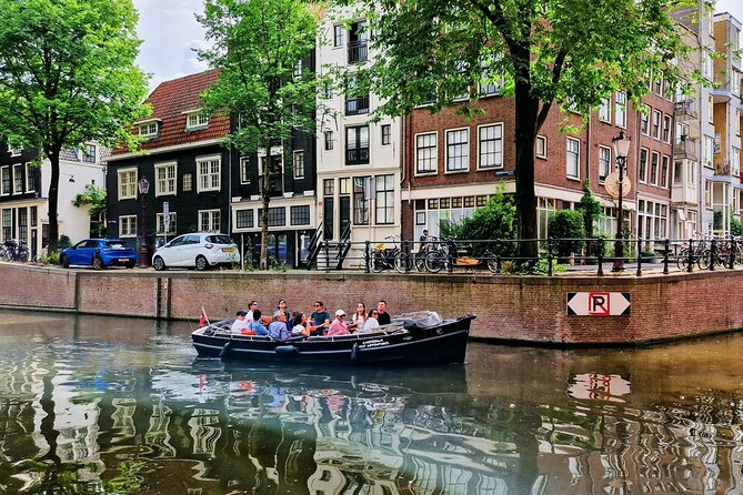 Amsterdam Private Canal Cruise – 90 Minutes through the Old City - Old churches and canal storytelling: Oude Kerk and Oudezijds Voorburgwal