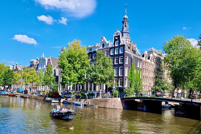 Amsterdam Private Canal Cruise – 90 Minutes through the Old City - Waterlooplein market and small canal views: variety without extra walking