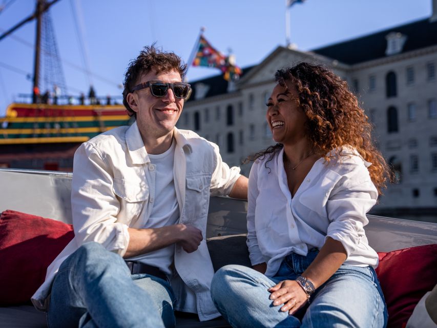Amsterdam: Private Canal Cruise with Drinks and Snacks - The boat setup: cozy cruising with a rain roof