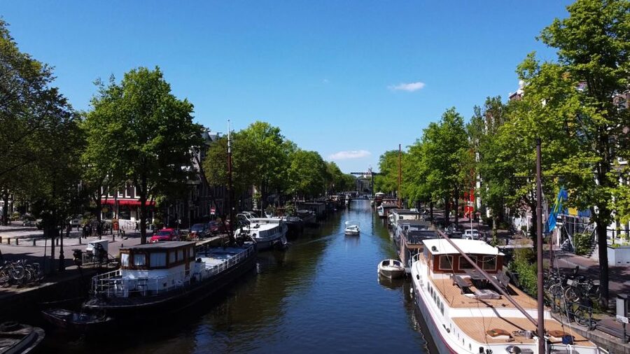 Amsterdam: Private Canal Tour - The Monet painting spot and how the stories make the city click
