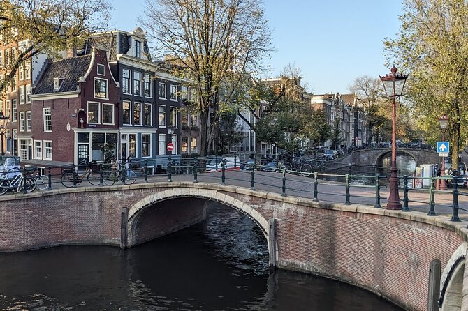 Amsterdam private city walking experience with a local - Nieuwmarkt: Waag, Guild Power, and Dancing Houses