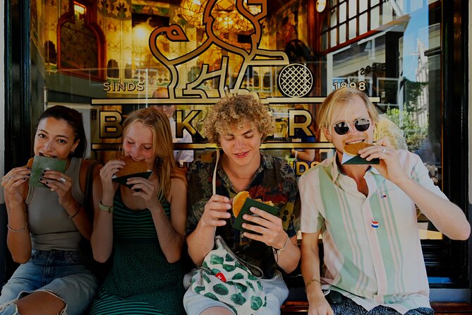 Amsterdam Private Food & Drinks Tour by UNESCO Canals & Jordaan - Beyond main streets: Flower Market and the Spui university area