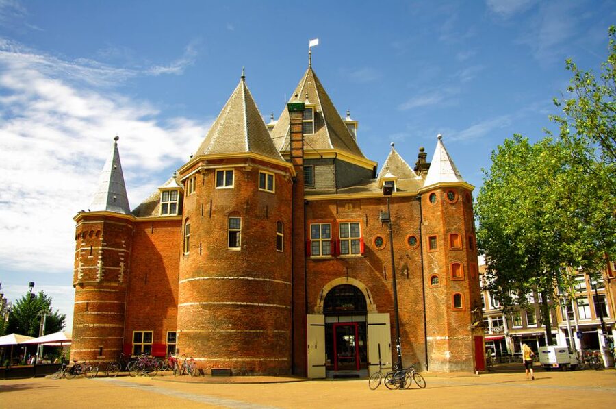 Amsterdam: Private Guided Walking Tour - Canal Belt Views: bridges, houseboats, and the Canal Ring feeling