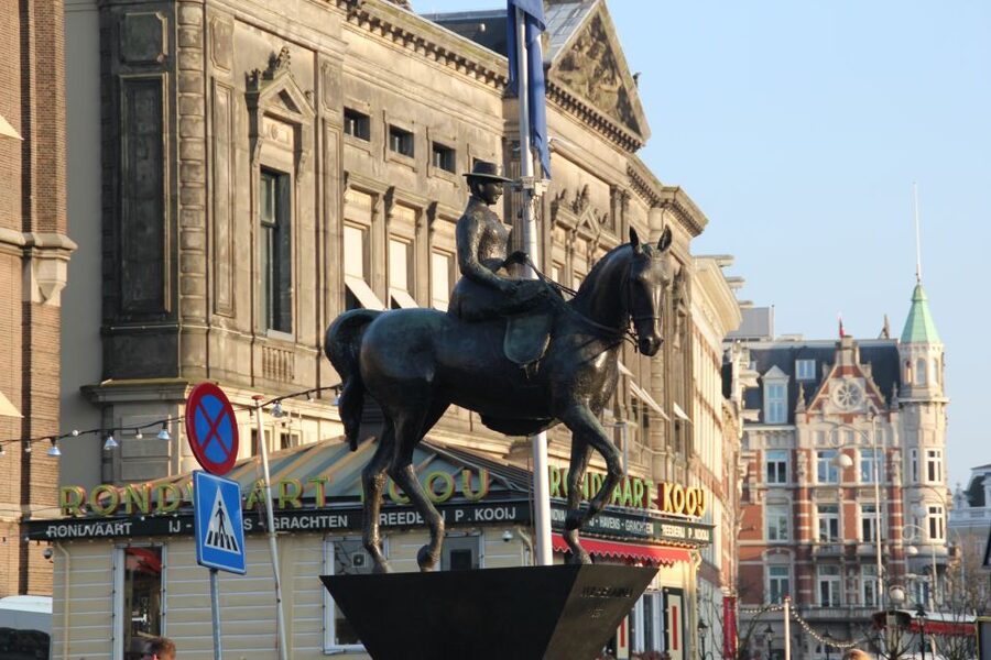 Amsterdam: Private Hidden Gems Discovery Tour - Dam Square orientation: palace, city hall past, and instant context