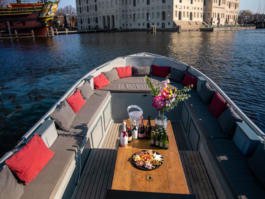 Amsterdam: Private Luxury Cruise with Pizza and Drinks - Roos boat, private pace, and where you actually meet