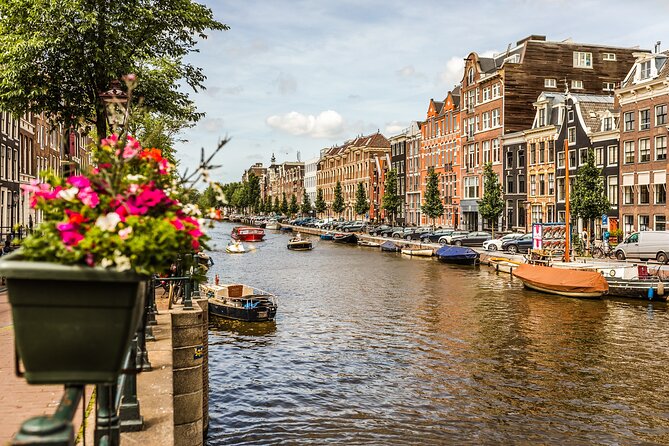 Amsterdam Private & Personalized Full-Day Tour with a Local Guide - Calm green quarter: elegant homes, wide boulevards, slower stories
