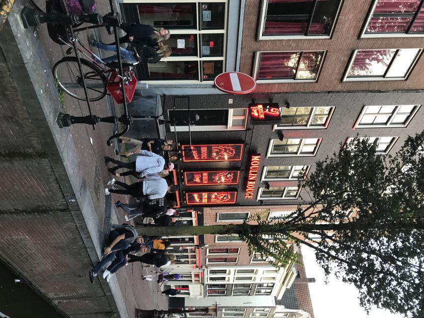 Amsterdam: Private Red Light District and Food Tour - China Town, the narrowest house, and the sights you will actually remember