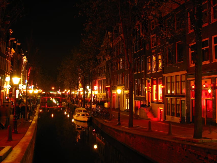 Amsterdam: Private Red Light District Tour in Spanish - Where You Start at Barbizon Palace, Then Head Into Zeedijk Street