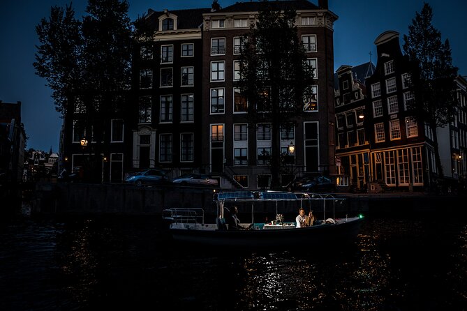 Amsterdam: Private Romantic Evening Canal Cruise + Bubbles/Snacks - Floating Flower Market at Night, With a Different Mood