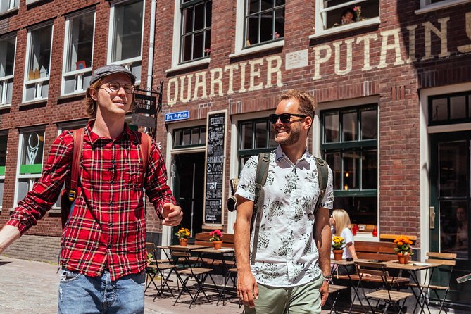 Amsterdam Private Tour: Highlights & Hidden Gems by Bike or Foot - Dam Square and Royal Palace, seen from street level