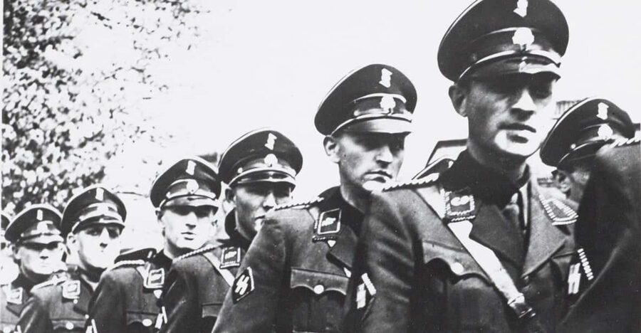 Amsterdam: Private World War Two History Walking Tour - The Wehrmacht arrival, photos from resistance fighters, and the city’s early shock