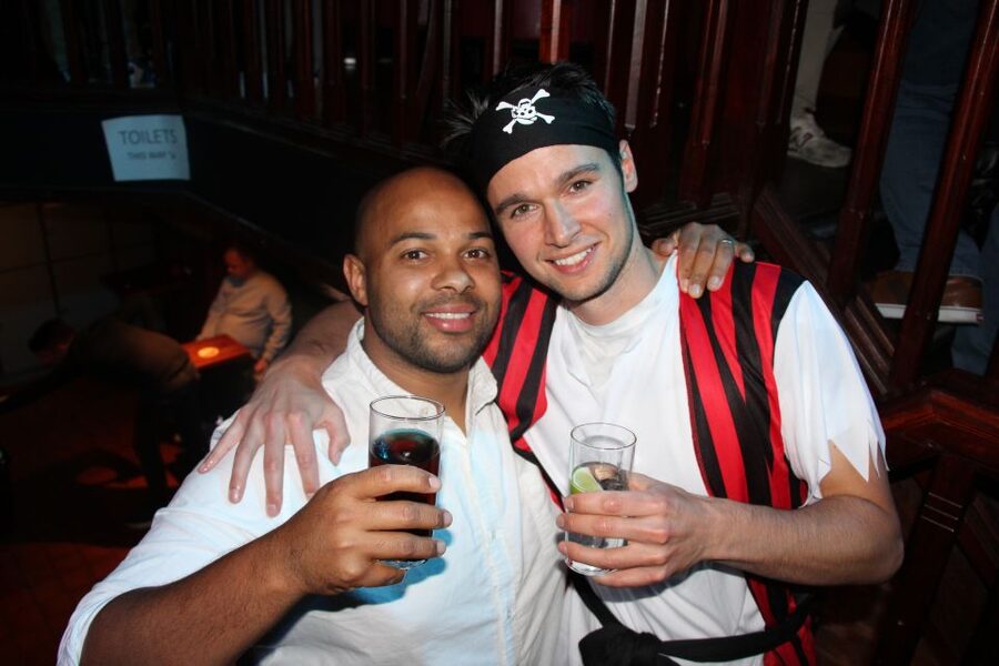 Amsterdam: Red-Light District Pub Crawl and Booze Boat Tour - Why this Amsterdam night works: cruise daytime energy, nightlife momentum