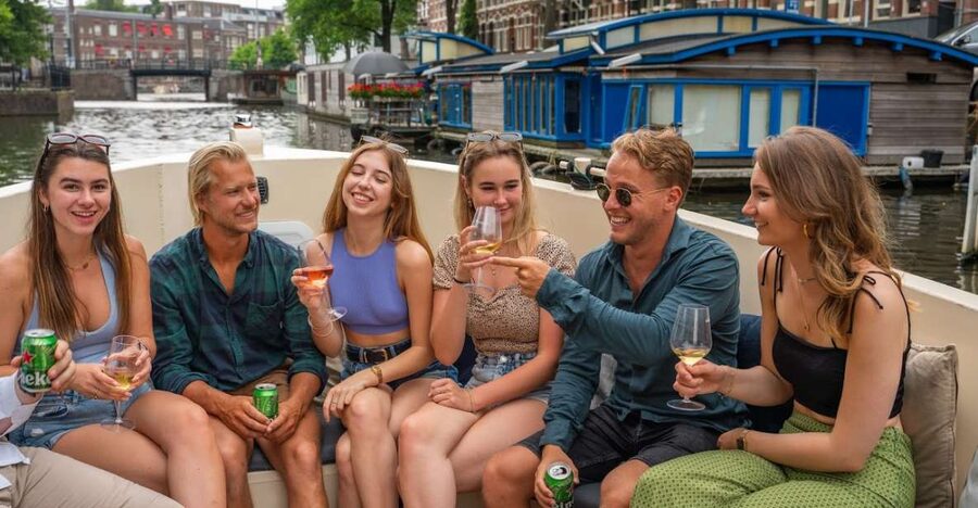 Amsterdam: Red-Light District Pub Crawl and Booze Boat Tour - From Starboard to The Black Tiger Bar: timing your switch