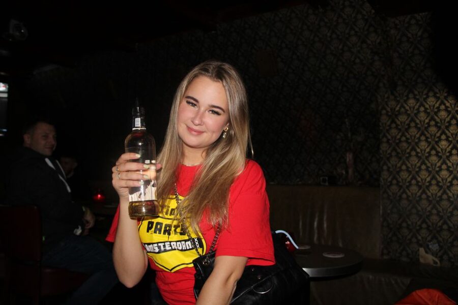Amsterdam: Red-Light District Pub Crawl and Booze Boat Tour - Red Light District pub crawl flow: four bars, shots, games, and door hosts