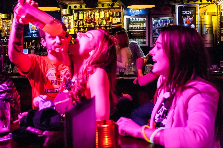 Amsterdam: Red Light District Pub Crawl with Unlimited Shots - Red Light District nightlife, but with a built-in plan
