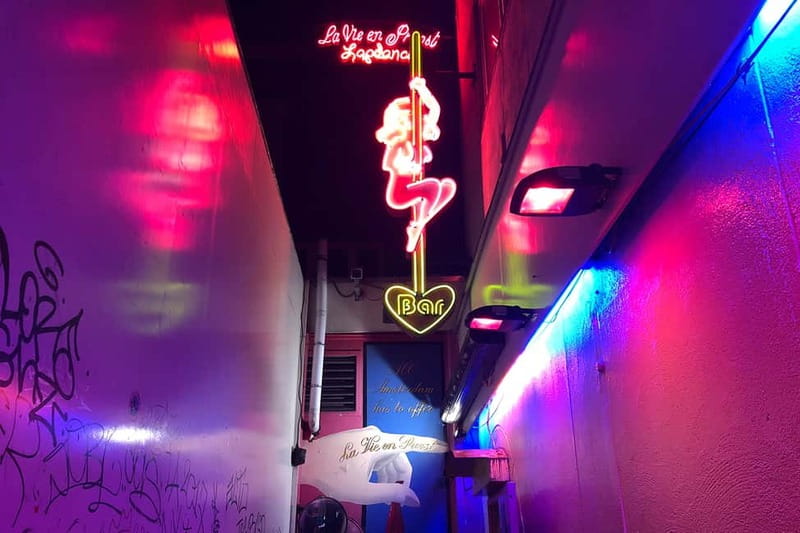 Amsterdam: Red Light District Tour - Dam Square, Condomerie, and Leidse Square: How the District Sits in Real City Life