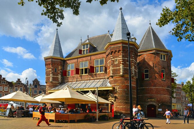 Amsterdam Red Light District Treasure: Self-Guided Tour & Quest - Montelbaanstoren: when a canal tower becomes part of your game