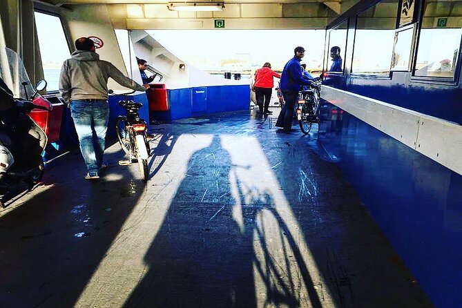Amsterdam's Hidden Gems and Street Art Bike Tour - NDSM Wharf: industrial history, street art terrain, and a drink stop