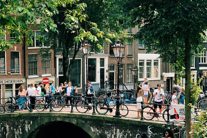Amsterdam's Unexpected Treasures Private Walking Tour - Starting at Amsterdam Centraal: architecture first, then the city rhythm