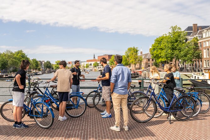 Amsterdam Small-Group Bike Tour With Canal Cruise, Drinks, Cheese - Narrow bridge crossing and the Museumplein museum zone