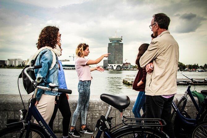 Amsterdam Small-Group Bike Tour With Canal Cruise, Drinks, Cheese - Prins Hendrik Bust, then off to the canal cruise
