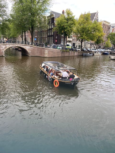 Amsterdam Small Group Canal Cruise inc Snacks/Drinks Winter - Light Festival atmosphere without losing the Amsterdam story