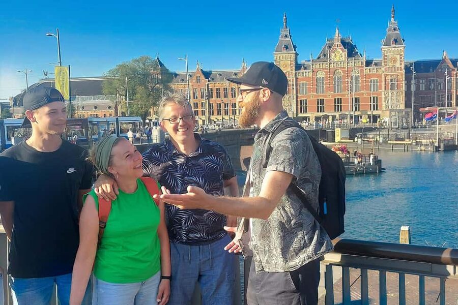 Amsterdam: Small-group Guided Walking Tour (French/English) - Trading history and canal-belt context, up to Dam Square