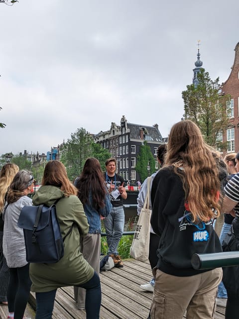 Amsterdam: small group tour: History, humor & hidden gems - The Canal-Belt Walk That Keeps Moving (Red Light District and Oude Zijde)