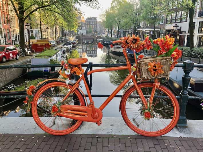 Amsterdam: Small Group Walking Tour with Fun Guide - Dam Square, the city’s turning point, and what to watch for