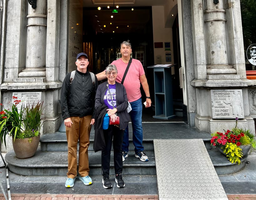 Amsterdam: Small Group Walking Tour with Fun Guide - Hidden gardens and brown cafés, plus why you stop halfway