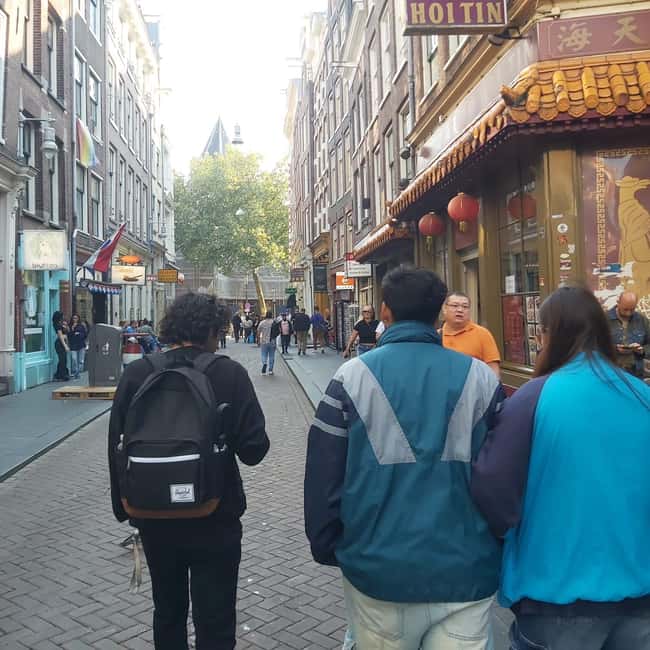 Amsterdam: Spanish Tour Unmasking the Redlight District - How the Red Light District became tied to progressive thought