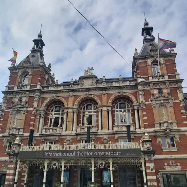 Amsterdam: Spanish Tour Unmasking the Redlight District - Zeedijk and the sailor streets that set the stage