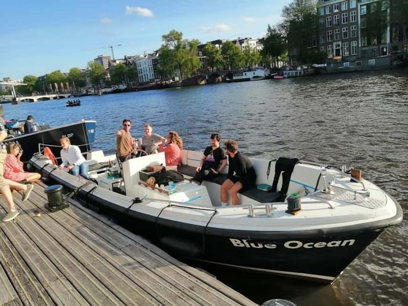 Amsterdam: The Bulldog Boat Smoke and Booze Cruise - The half-open boat: comfort tips that save your trip
