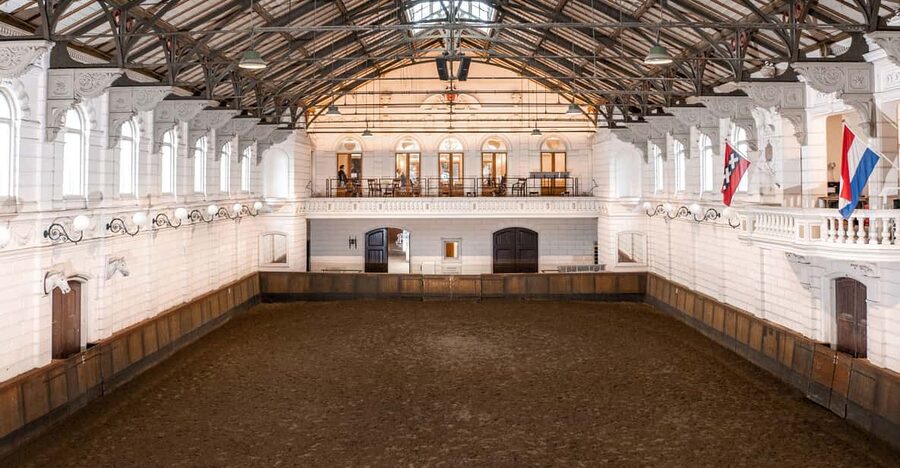 Amsterdam: The 'Hollandsche Manege' Stables Entry Ticket - Live lessons: classical training, right where it happens
