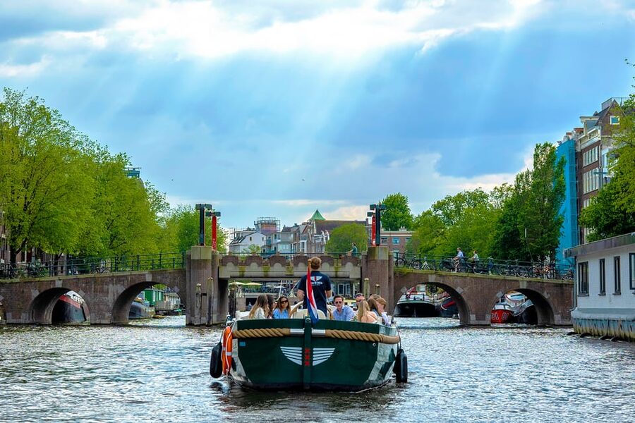 Amsterdam: The Newest Canal Cruise with Drink Option - Weather reality: open, partly covered, or fully covered