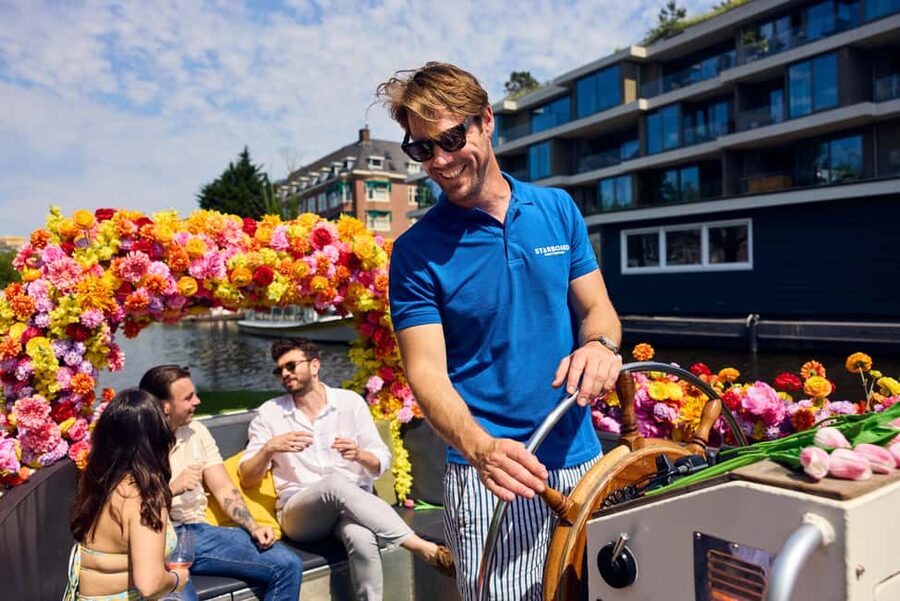 Amsterdam: The Original Flower Boat with Local Guide and Bar - Oudeschans, Herengracht, Skinny Bridge, and the photo-friendly beats in between