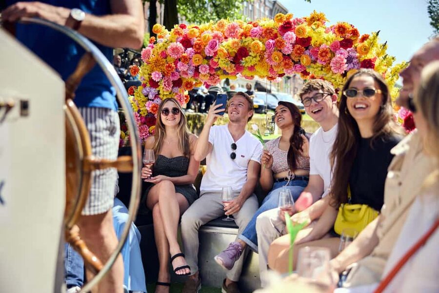 Amsterdam: The Original Flower Boat with Local Guide and Bar - Meeting at Oudezijds Voorburgwal 230, then easing into the canal route