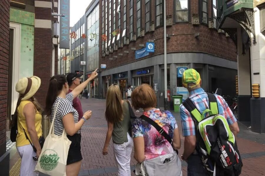 Amsterdam: The Story of History & Culture Walking Tour - Dog Tolkien and why small groups make a difference