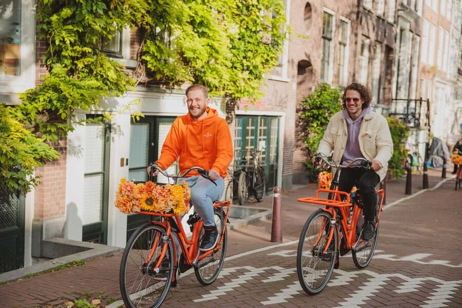 Amsterdam: Top Highlights Guided Bike Tour EN/DE/ES/FR/IT/CN - Anne Frank House Stop: Poignant Viewing With Tour-Realistic Timing