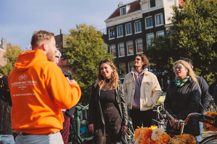 Amsterdam: Top Highlights Guided Bike Tour EN/DE/ES/FR/IT/CN - Leidse Square and the Food Market Moment