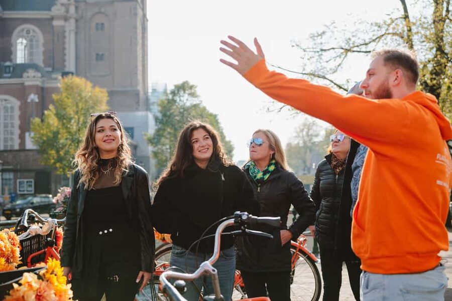 Amsterdam: Top Highlights Guided Bike Tour EN/DE/ES/FR/IT/CN - Nieuwezijds Voorburgwal to Jordaan: Start With the Right Neighborhood Energy