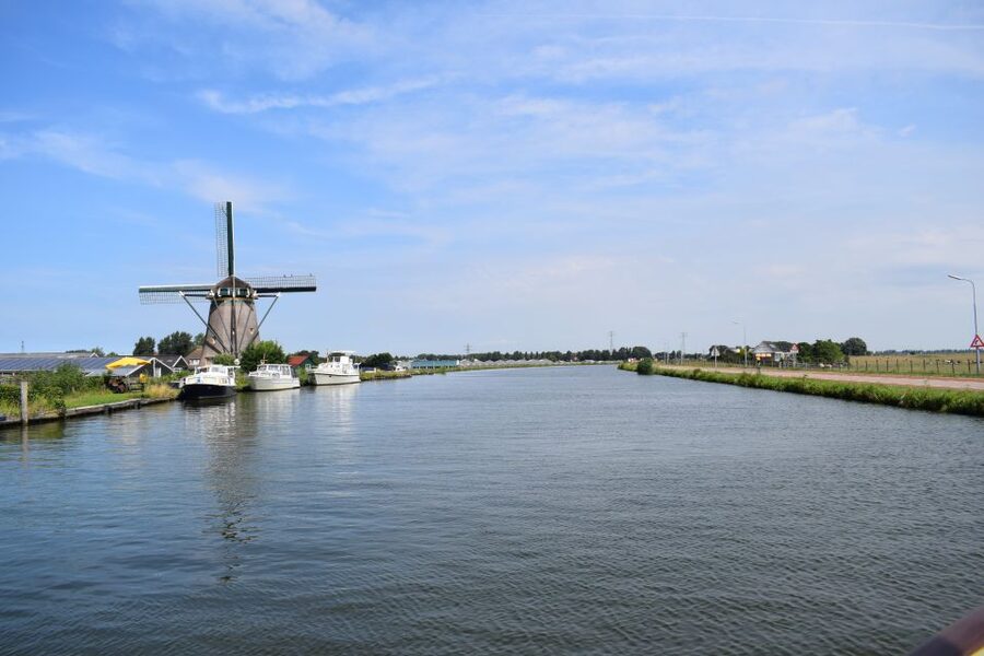 Amsterdam: Tour to Keukenhof Gardens with Windmill Cruise - Warmond Windmill Cruise: Polders, Working Mills, and Real Dutch Water Control