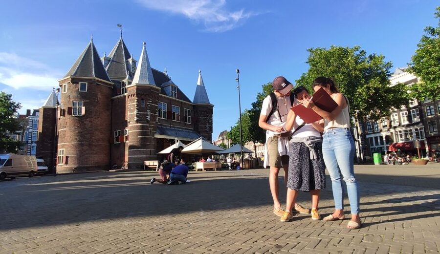 Amsterdam: Treasure Hunt Walking Tour "A Secret Sender" - Nieuwmarkt Square: A Big Start With Real Amsterdam Atmosphere