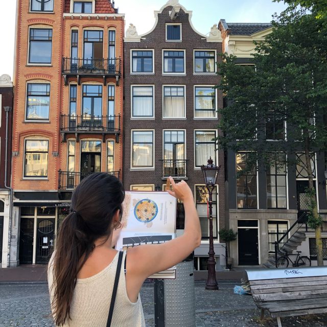 Amsterdam: Treasure Hunt Walking Tour "A Secret Sender" - Mystery City Games: Pick Up Your Puzzle Backpack
