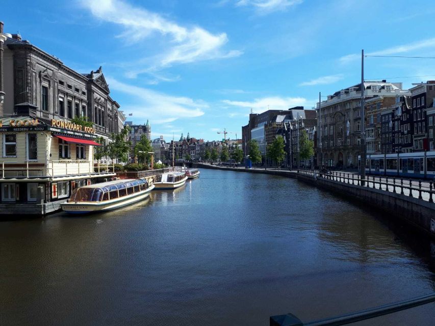 Amsterdam Walking Tour and Canal Cruise - The Street Market Stop: Browse Like a Local